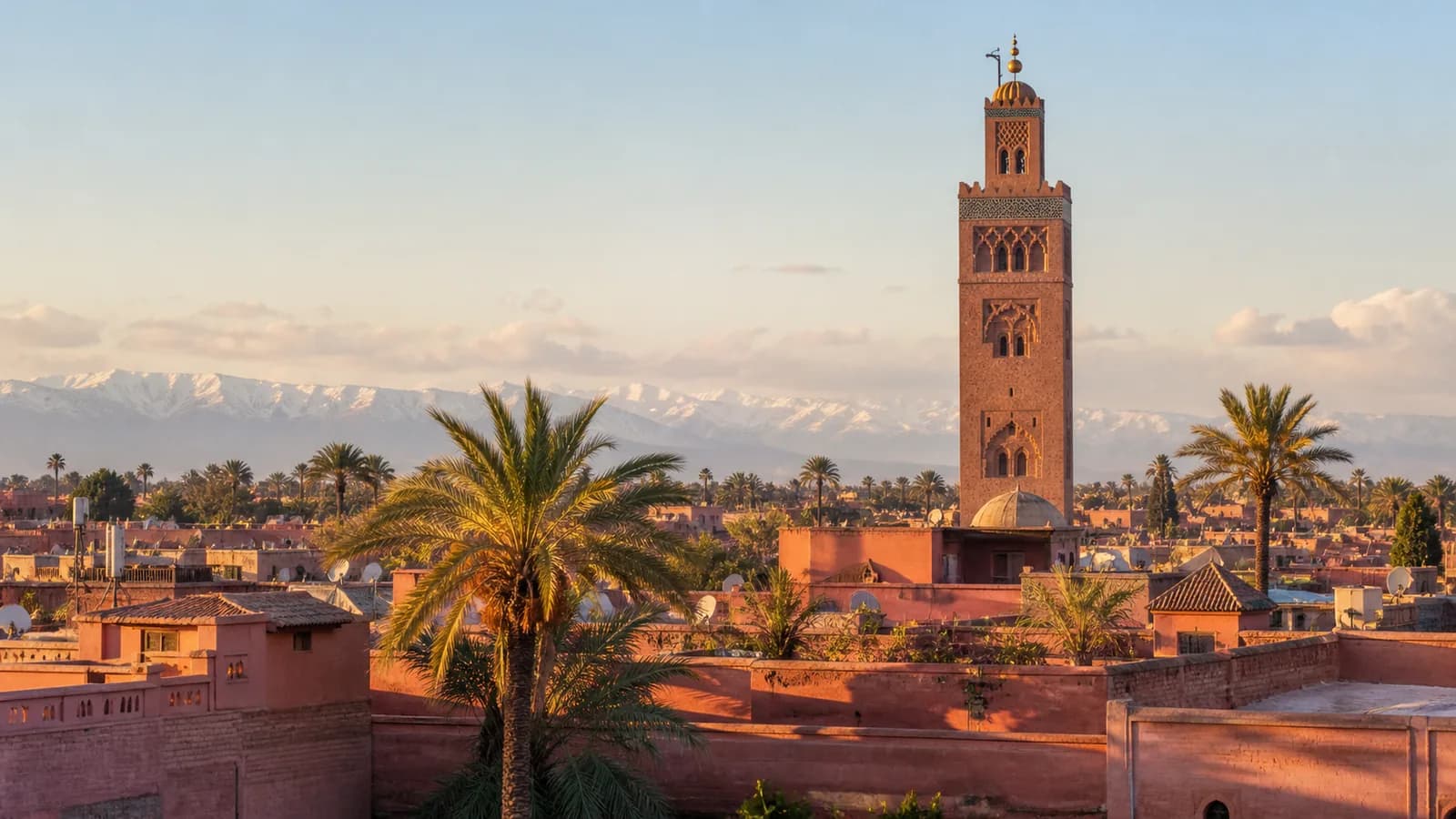 The Koutoubia minaret above Marrakech with the Atlas Mountains beyond